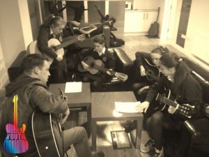 Musical Youth Foundation - Teaching guitar at St Andrews b&w