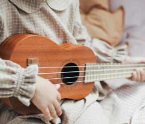 ukelele playing close up